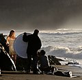 Photographing a model. An assistant is holding a reflector.