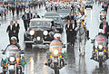 Rousseff's Inaugural Parade at the Ministries Esplanade. Police motorcycles and bodyguards surround the Presidential Rolls-Royce, followed by a 1968 Cadillac De Ville convertible used by Vice President Michel Temer.