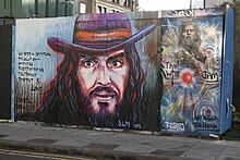 Street art by unknown artist on Hackney Street, London Russell Brand street art Hackney.jpg