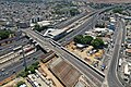 תחנת הרכבת תל אביב ההגנה, מחלף קיבוץ גלויות ועבודות להקמת גשר הקו הסגול מעל נתיבי איילון, יוני 2023