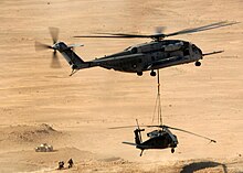 CH-53E Super Stallion lifts a disabled UH-60 USMC-06991.jpg