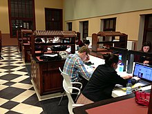 Students study in learning center AGORA at KU Leuven. AGORA Leuven.jpg