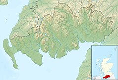 Mapa konturowa Dumfries and Galloway, blisko centrum na lewo u góry znajduje się czarny trójkącik z opisem „Merrick”