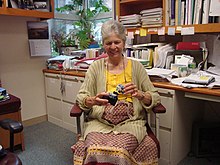 Joan A. Steitz in her office with models.jpg