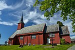 Foto einer roten Holzkirche