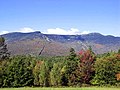 Image 19Mount Mansfield, at 4,393 feet (1,339 m), is the highest-elevation point in Vermont. Other high points are Killington Peak, Mount Ellen, Mount Abraham, and Camel's Hump. The lowest point in the state is Lake Champlain at 95 feet (29 m). The state's average elevation is 1,000 feet (300 m). (from History of Vermont)