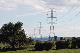 In small countries like New Zealand, electricity transmission is a natural monopoly. Due to enormous fixed costs and small market size, one seller can serve the entire market at the downward-sloping section of its average cost curve, meaning that it will have lower average costs than any potential entrant. NIGU transmision line near Te Kauwhata.JPG