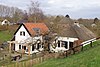 Perceelsgedeelte van een kleine gepleisterde boerderij