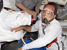 Astronaut Steven G. MacLean pre-breathes prior to an EVA Prebreathe.jpg