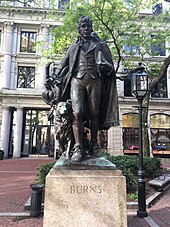 Statue of Burns and Luath, his Border Collie, in Winthrop Square, Boston, Massachusetts. It was moved back to its original location in the Back Bay Fens in 2019 Robert Burns Winthrop Square.jpg
