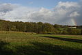 Sandleford Priory, and rainbow, and part of High Wood, from the old carriage track to the west, near Gorse Covert, 2015.