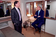Secretary of State John Kerry chats with MSNBC analyst Halperin before appearing on Morning Joe in New York. Secretary Kerry Chats With MSNBC Analyst Halperin Before Appearing on 'Morning Joe' in New York (25978831190).jpg