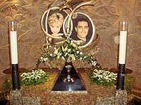One of the two memorials to Diana, Princess of Wales, and Dodi Al-Fayed, located in the Harrods department store in London. The pyramid-shaped display holds a wine glass still smudged with lipstick from Diana's last dinner as well as an engagement ring Dodi purchased (presumed for Diana) the day before they died.