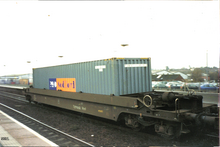 P&O Nedlloyd intermodal container in a tiphook intermodal freight well wagon at Banbury station. England, 2001 Banbury box car 2001 1st.png