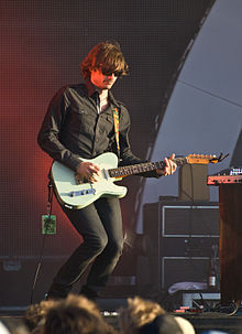 Middleton on guitar with Powderfinger in January 2010 at Big Day Out, Melbourne