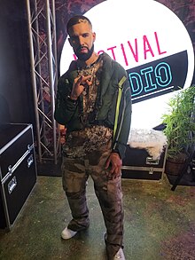 A wax figure of Drake in Madame Tussauds, London Drake Madame Tussauds London Wax Figure.jpg