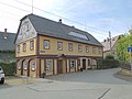 Wohnhaus (Umgebinde) mit Ladeneinbau