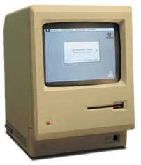 A w:Macintosh 128K (that has apparently been u...