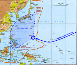 map of the western Pacific. An orange line marking the Japanese defenses runs from the Kuriles to New Guinea and Java. There is an arc showing the range of B-29 bombers that overlaps with Japan and the Philippines