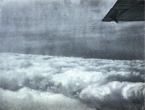 A picture of the view of the clouds from the window of the Friendship on her flight.