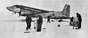 A LC-117D "Semper Shafters USMC" with ski landing gear and weather radar in the nose near the Beardmore Glacier, Antarctica, 1961.