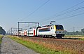 Locomotive 1831 remorquant une rame de voitures M6 entre Bruges et Knokke.