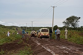 Route boueuse au début de la saison des pluies (mars).