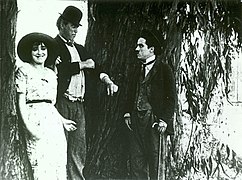 Mabel Normand, Mack Sennett dan Charles Chaplin dalam film The Fatal Mallet (1914)