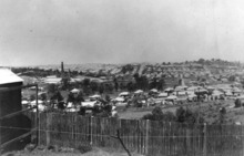 View of Newmarket with the brickworks chimney on the left, circa 1925