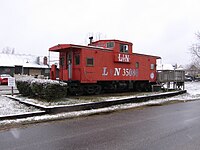 The City of Helena Welcome Center is housed in a Louisville & Nashville Railroad caboose in Old Town next to the CSX S&NA Subdivision tracks.