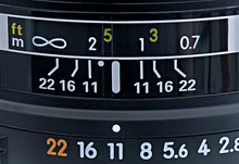 Detail from a lens set to
f/11. The point half-way between the 1 m and 2 m marks, the DOF limits at
f/11, represents the focus distance of approximately 1.33 m (the reciprocal of the mean of the reciprocals of 1 and 2 being 4/3). DOF scale detail.png