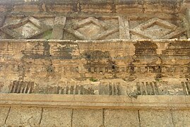 Carved details on the top part of the walls