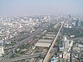 A view east from the observation platform of Bangkok's Bayoke tower showing Airport Rail link