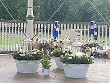 Flowers on the bandstand in memory of the three victims Forbury Gardens 2020-07-10 19.35.51.jpg