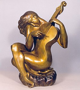 Sculpture of a nude woman playing a guitar