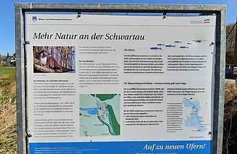 Info-Tafel mit Grafik vom Bachumlauf um das Mühlenstauwehr.