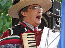 Chilean huaso playing accordion Musico chileno tocando cueca.jpg