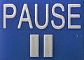 PAUSE-button - Macro photography of a remote control.jpg