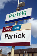 Bilingual sign (Scottish Gaelic and English) at Partick railway station, Glasgow PartickPartaig.jpg