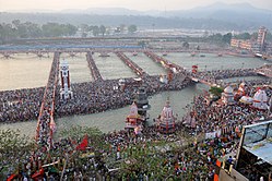 Pilgrims gather for the third Shahi Snan ('royal bath') at Har ki Pauri in Haridwar, Uttarakhand on 14 April 2010 during Haridwar Kumbh Mela. Third Shahi Snan in Hari Ki Pauri.jpg