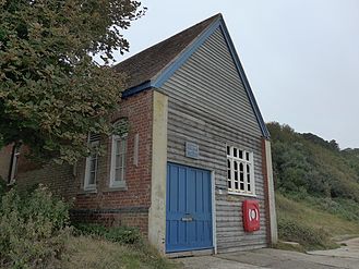 The old Boathouse at Totland Bay was demolished; this is actually H Simmonds' boatyard which was alongside the Lifeboat Station.