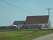 Usine à Baie-du-Petit-Pokemouche. Il y a des taches.