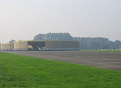 Round concrete hangars at Grimbergen Airfield, Belgium.