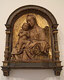 Мадонна с Младенцем. 1475. Терракота. Музей Боде, Берлин