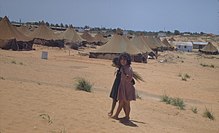 An old picture from 1950 showing Yemenite Jews in Ma'abarot, a series of refugee camps in Israel.