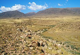 A dry gulch in the desert near Tamchy, Kyrgyzstan. The creek that may have run along the bottom of the gulch in the past has been diverted to a parallel aryk. E8236-Tamchy-dry-gulch.jpg