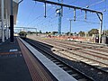 Northbound view from Platform 2 with a Comeng train stationary at platform 2 preparing for a Flinders Street-bound service, February 2024