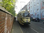 Modell "Grossraum-Triebwagen" vid hållplatsen Meißelstraße i Styrum i Mülheim an der Ruhr, den sista driftdagen den 3 oktober 2015