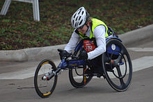Holly Koester, who incurred a spinal injury as a result of a motor vehicle collision, is now a wheelchair racer. Holly Koester, 2007 Chevron Houston Marathon (357322273).jpg