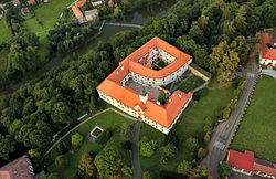 Aerial view of the Komorní Hrádek chateau and surrounding land